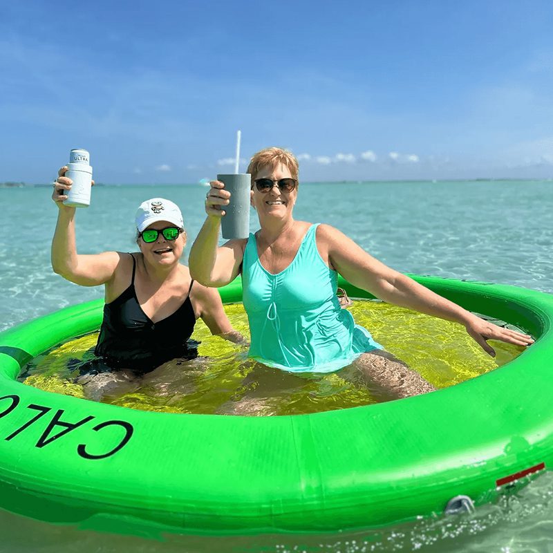 Sunny day fun on green water float