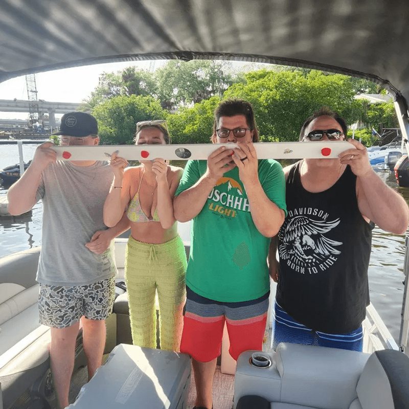 Friends drinking on a boat