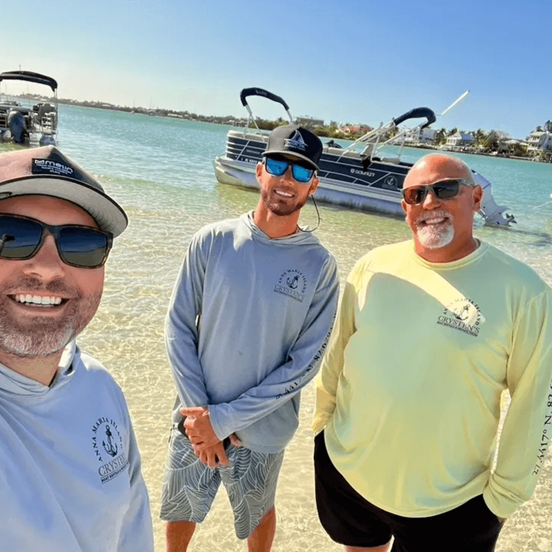 Group of men on a beach outing.
