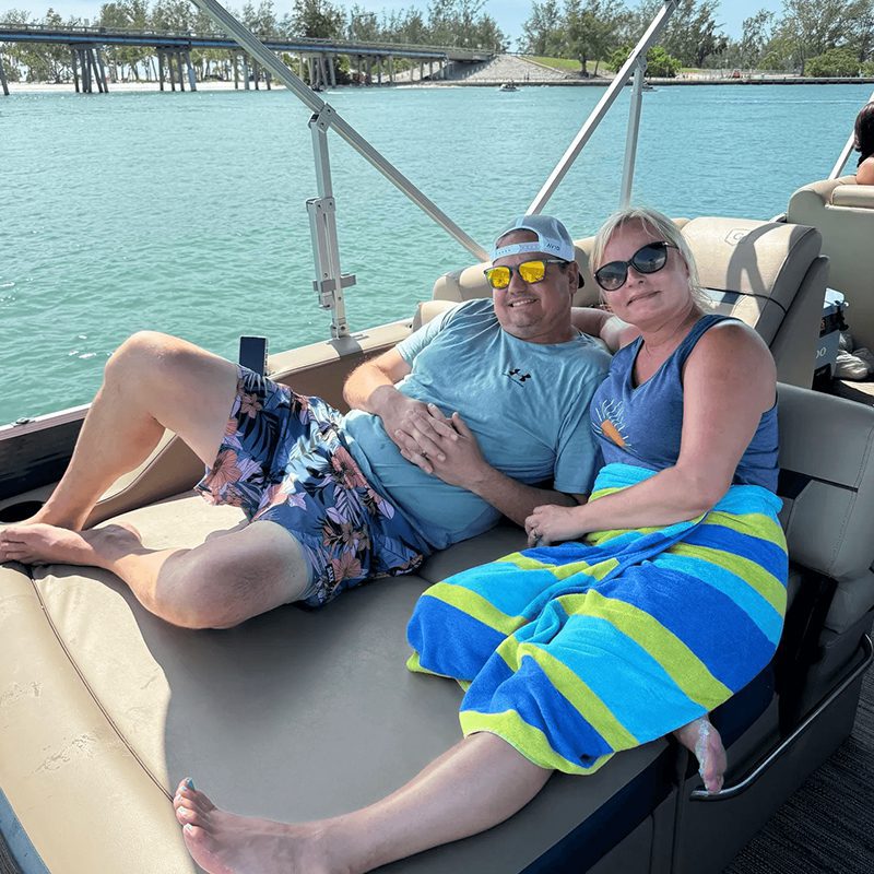 Friends enjoying a sunny day boating