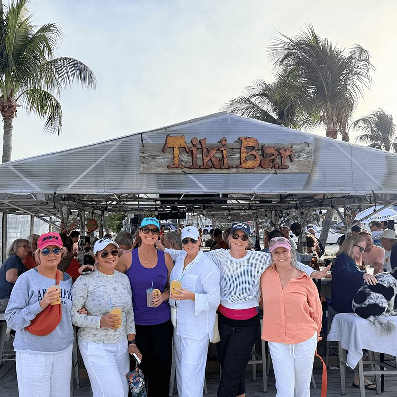 Group enjoying drinks at Tiki Bar