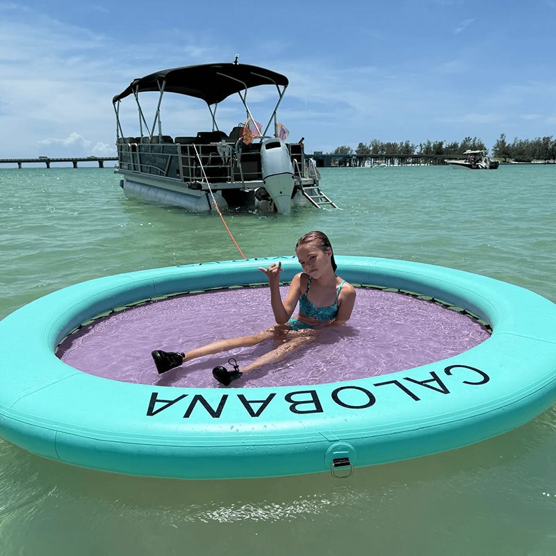 Girl relaxing on inflatable water float