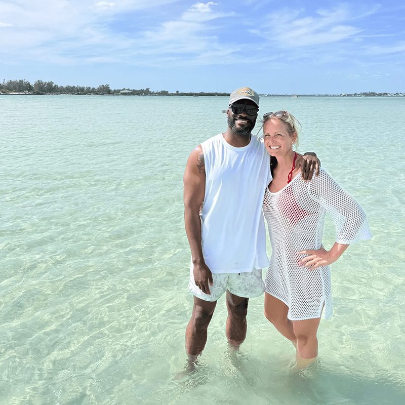 Couple enjoying a sunny beach day