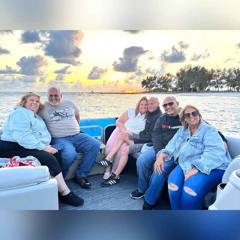 Smiling group during sunset cruise