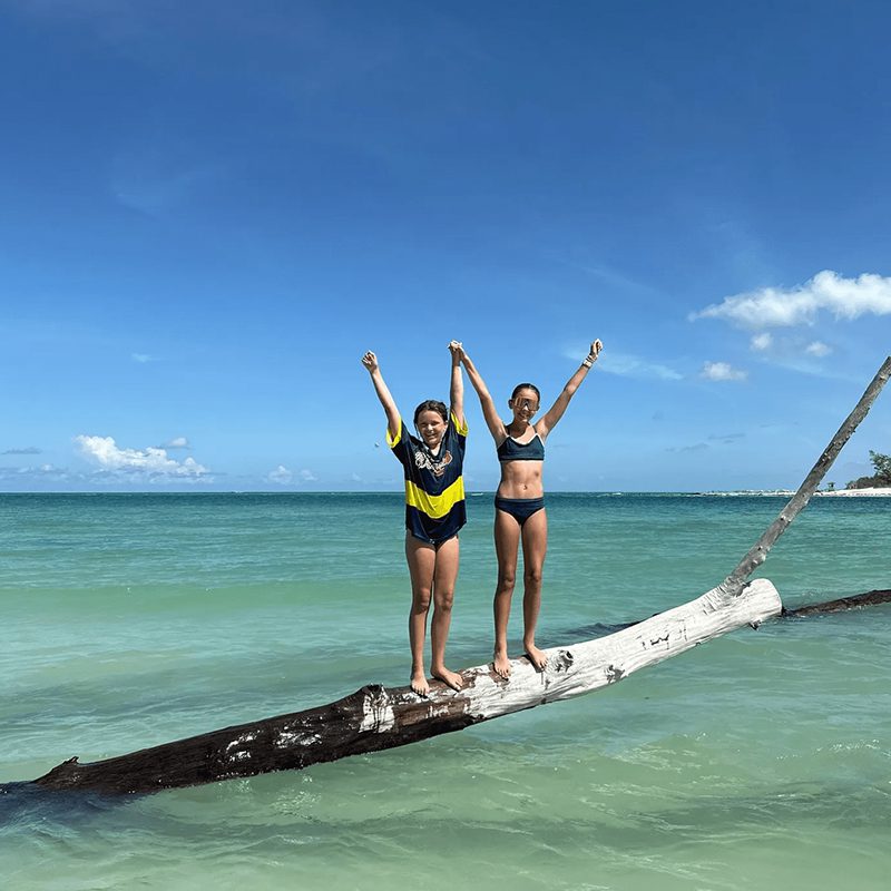 Friends enjoying a sunny beach day