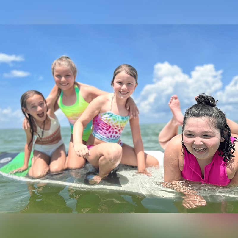 Friends enjoying the ocean waves