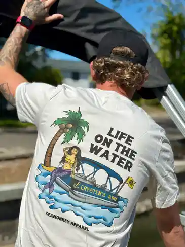 Graphic t-shirt with boat and mermaid design