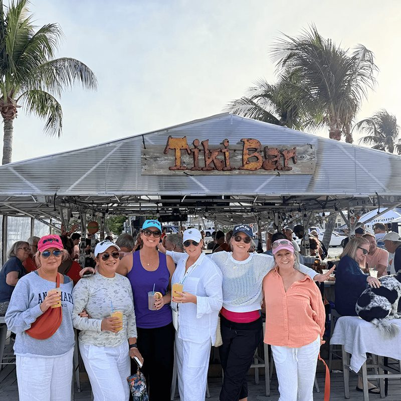 Group enjoying drinks at Tiki Bar