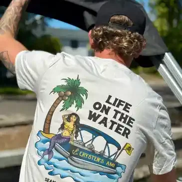 Graphic t-shirt with boat and mermaid design